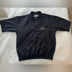 ZERO Half-sleeve golf wind/rain pullover. Charles Schwab Cup Championship logo.